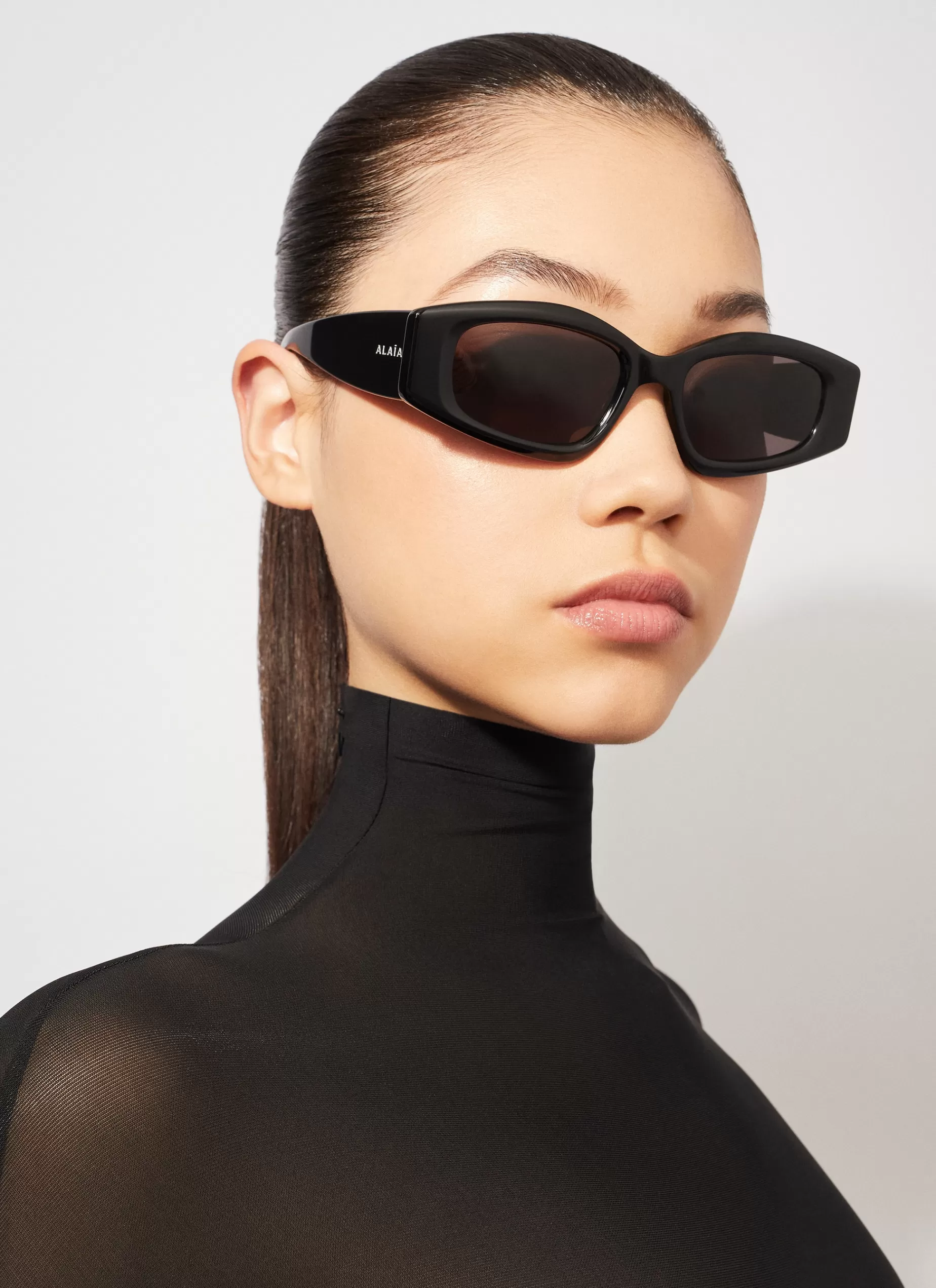 Alaïa OVALE SONNENBRILLE< Sonnenbrillen