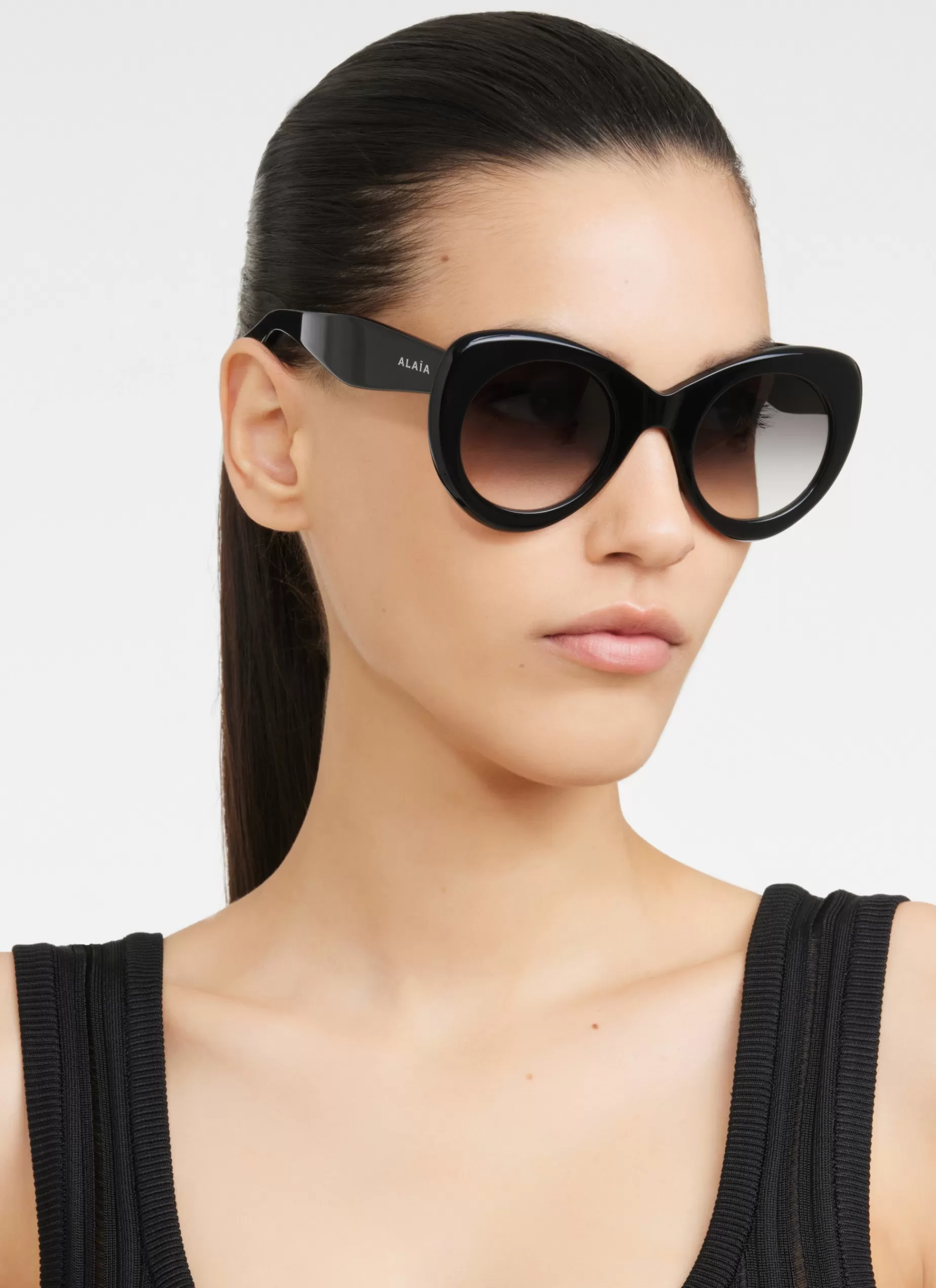 Alaïa SCHMETTERLINGSFÖRMIGE SONNENBRILLE< Sonnenbrillen